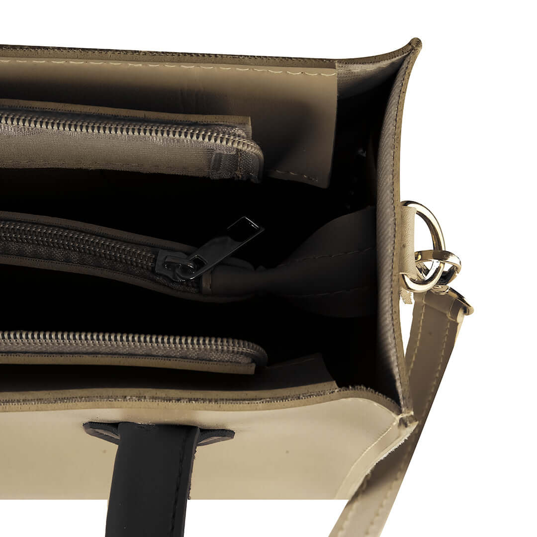 Elegant Beige Tote Bag with Black Tassel Accent